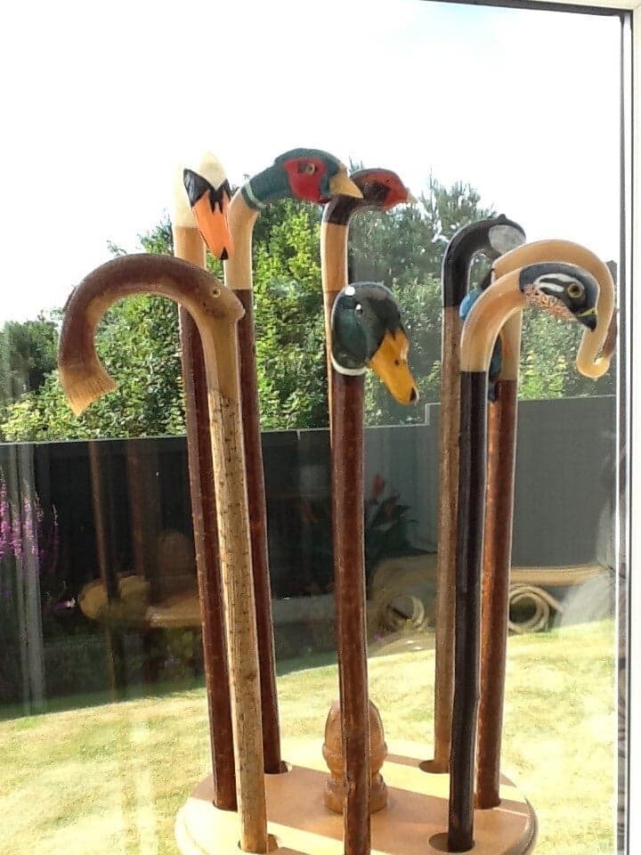 A finished bespoke walking stick with a carved horn handle